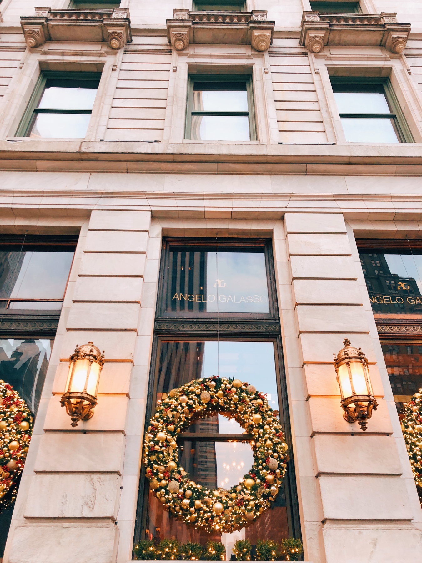 Giant Christmas wreaths on the Plaza Hotel